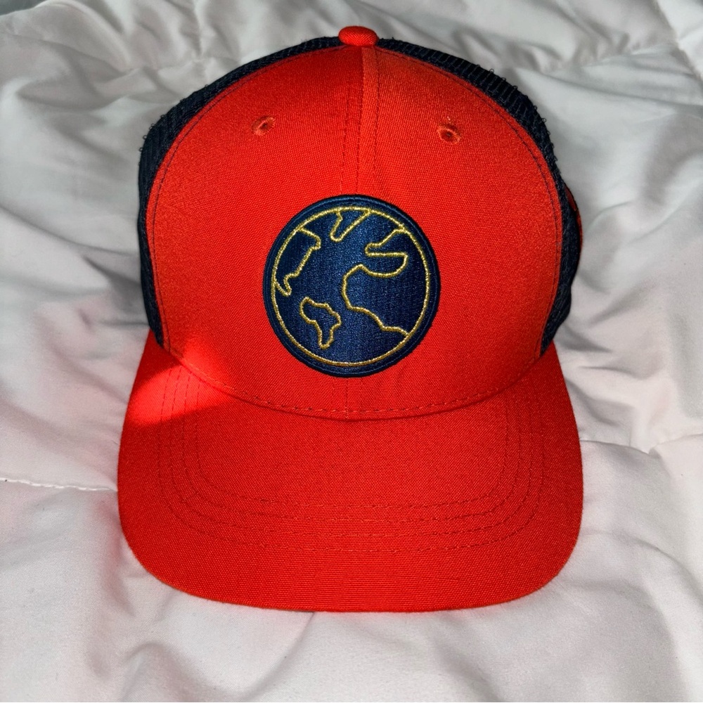 NWOT Reflo Golf Apparel Brand Red and Navy Cap with Earth Logo